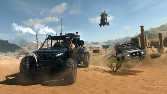 A helicopter and two ground vehicles moving through the desert, with sandstone ruins in the background