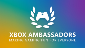 An Xbox Ambassadors controller and laurel leaves logo on a rainbow background.